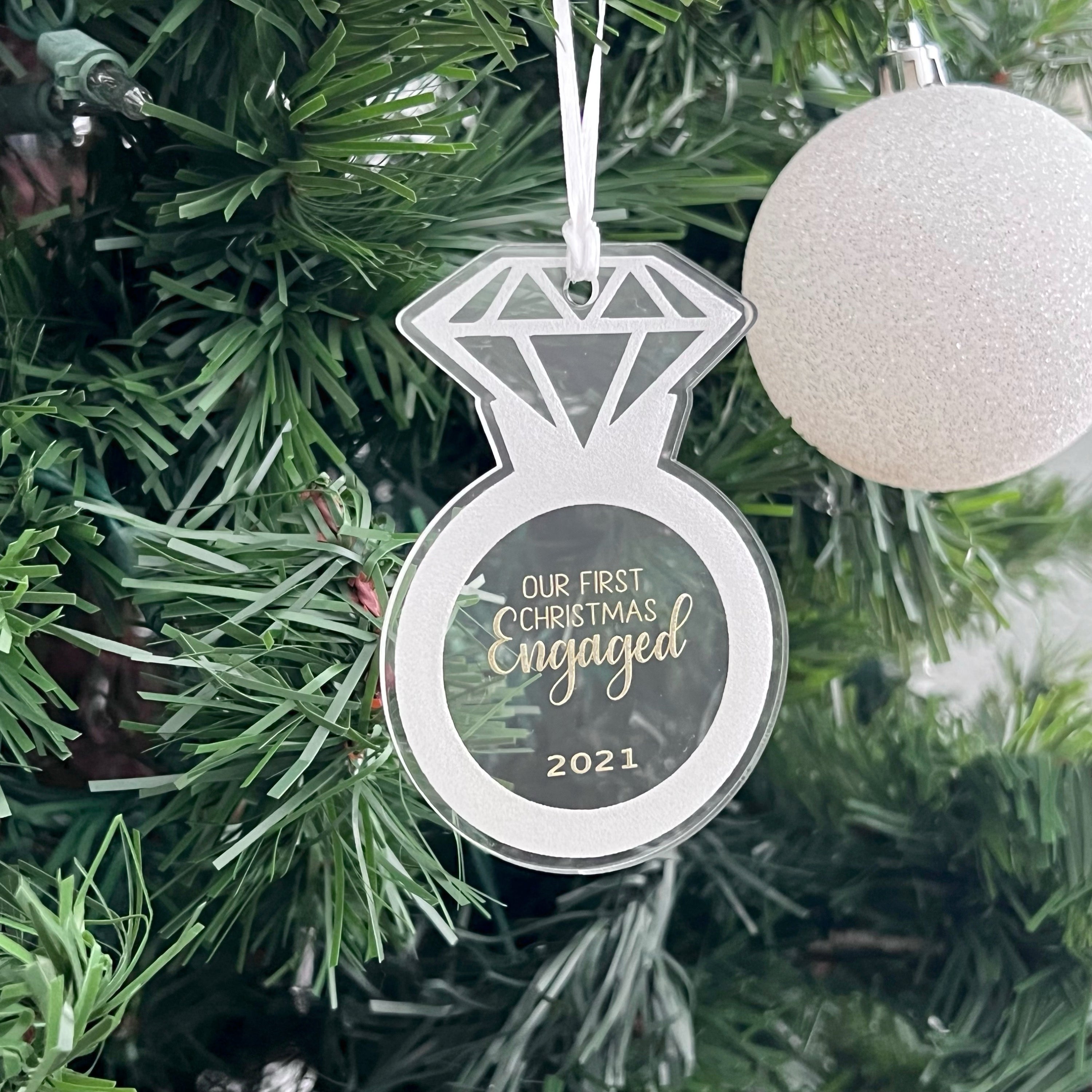 alt="engaged or married clear acrylic ornament"