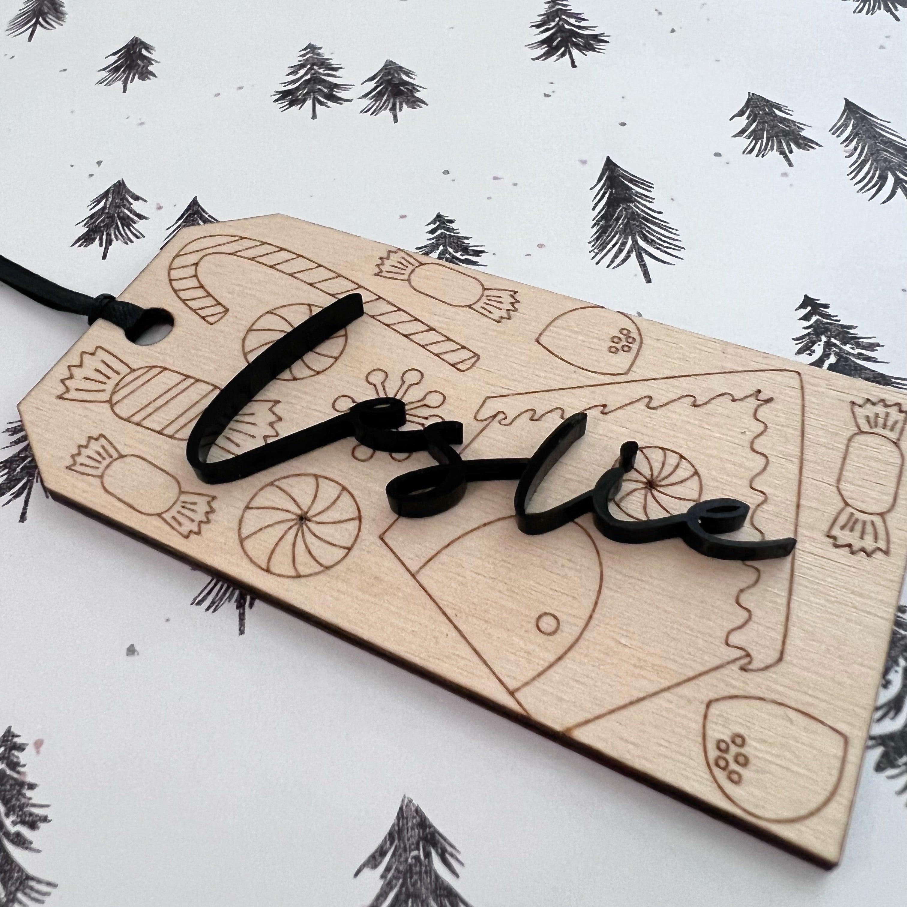 alt="wood engraved  black acrylic personalized Christmas tags"